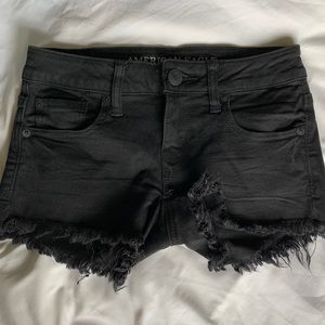 AMERICAN EAGLE frayed black denim shorts